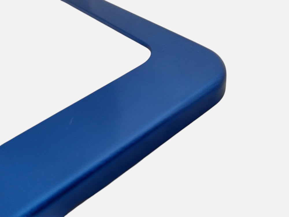 Blue anodized aluminum license plate frame finish close-up